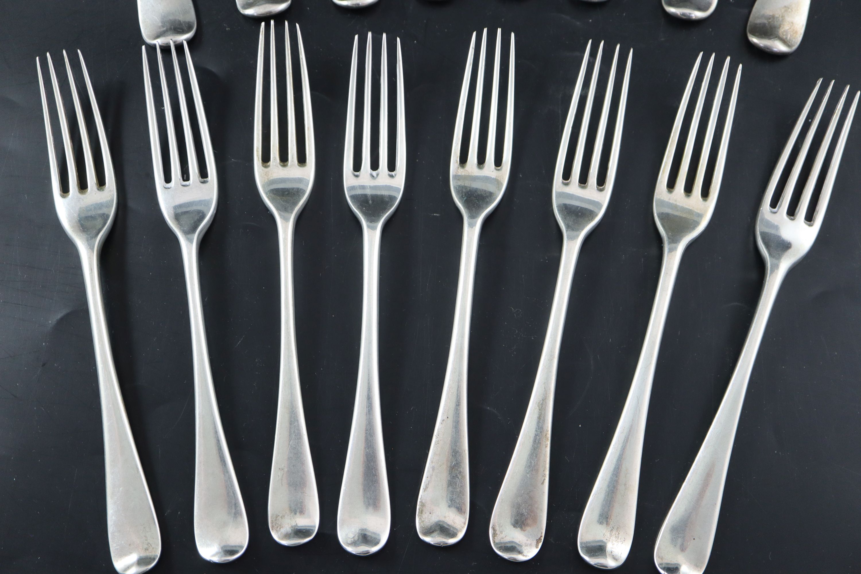 Eight Victorian silver Old English pattern table forks and eight matching entree forks